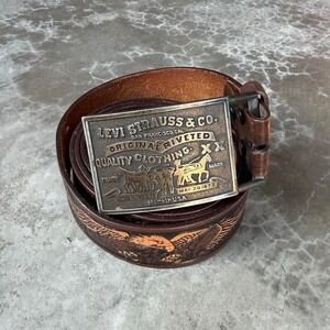 Vintage Levi's MADE IN USA brass belt buckle with tooled leather wrangler belt